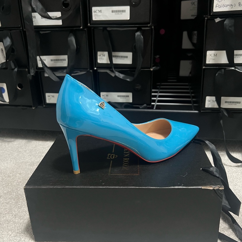 Turquoise pumps size 12